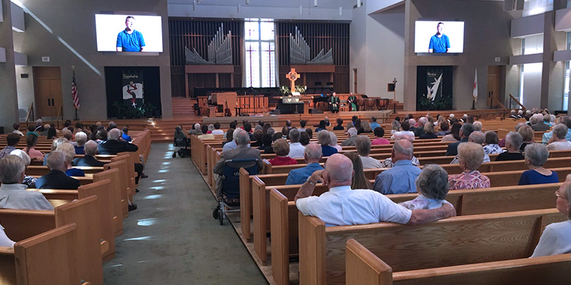 congregation engaged during church with the help of church led wall displays