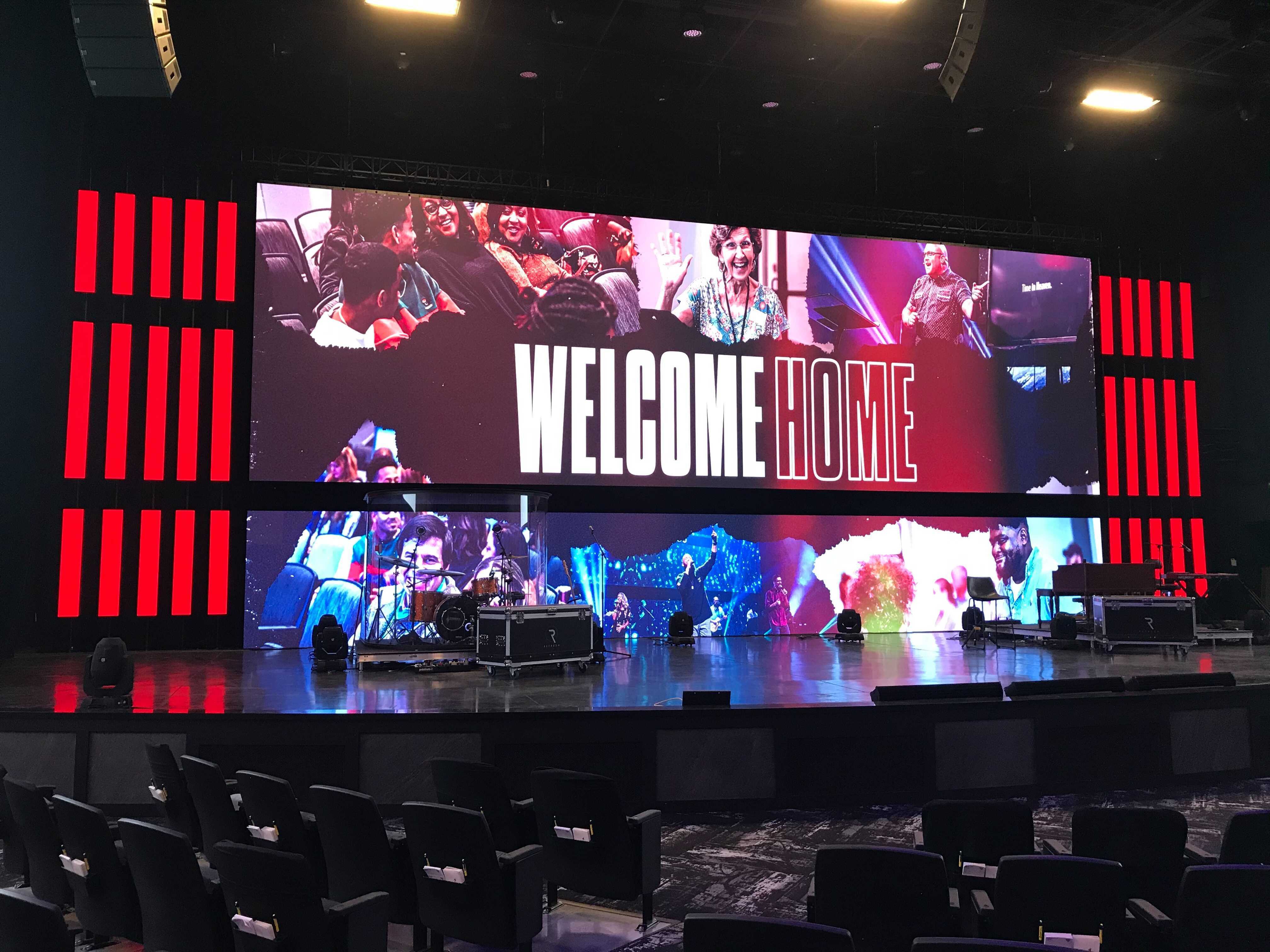 a 4k led screen that reads welcome home and it is being used on a church stage